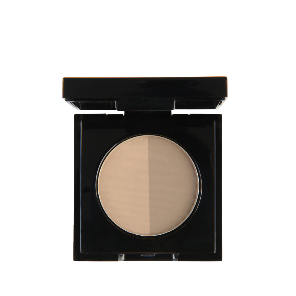 Garbo and Kelly brow powder in a compact, showing the soft, pigmented shades for natural eyebrow enhancement.