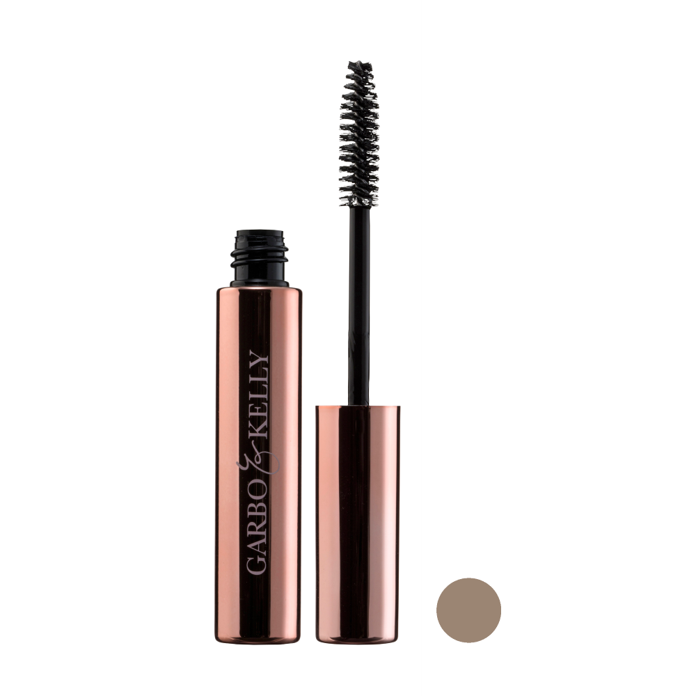 Garbo and Kelly brow gel in a clear tube, showcasing the product with a brush applicator for shaping and defining eyebrows.