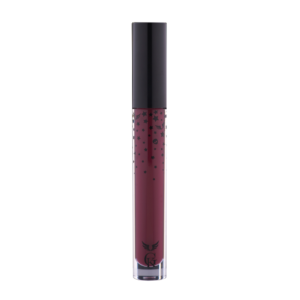 Garbo and Kelly Rock Liquid Matte Lipstick in bold red, showcasing the sleek tube and vibrant matte finish.