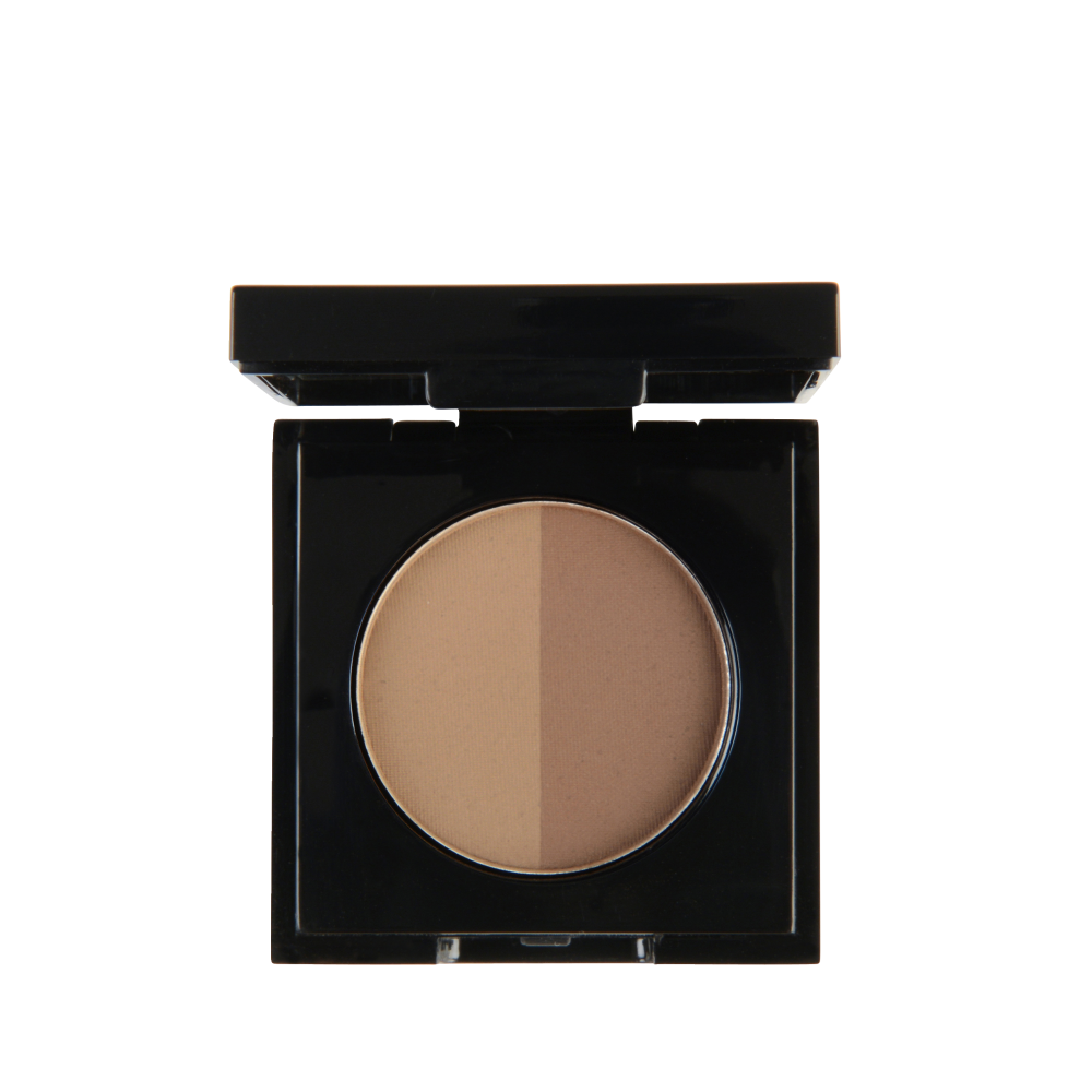 Close-up of Garbo and Kelly brow powder in a compact, showing the soft, pigmented eyebrow powder shade with applicator.