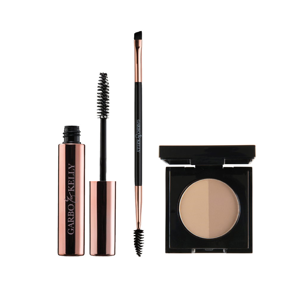 Garbo and Kelly Brow Magic Set featuring eyebrow pencils, gels, and tools for shaping and defining brows.