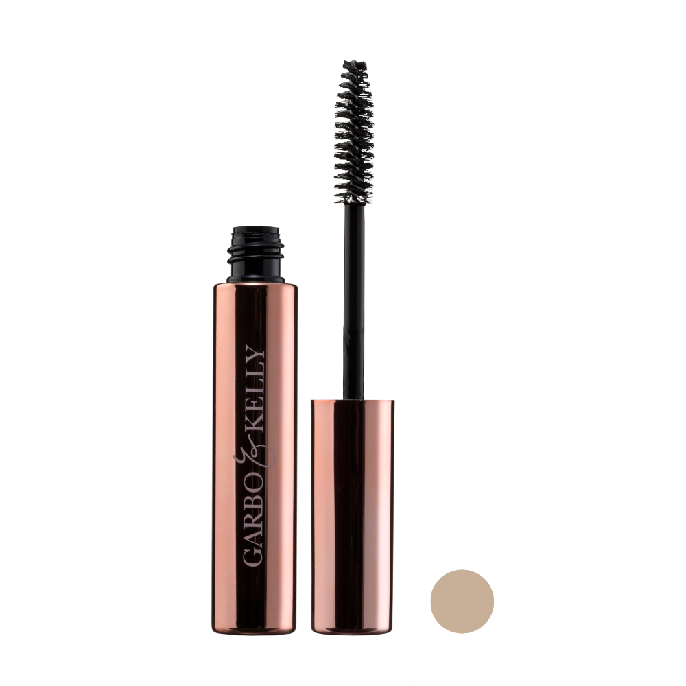 Garbo and Kelly brow gel in a sleek tube, featuring a clear or tinted formula for shaping and setting eyebrows.