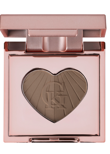 Close-up of Garbo and Kelly talc-free brow powder in a compact, showing the soft, natural shades for eyebrow shaping and filling.