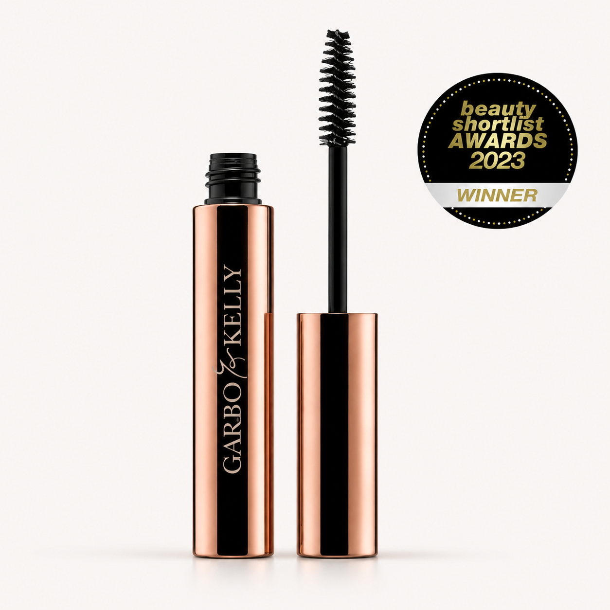 Close-up of Garbo & Kelly Brow Gel in a sleek tube, showcasing the clear gel formula for defining and shaping eyebrows. 