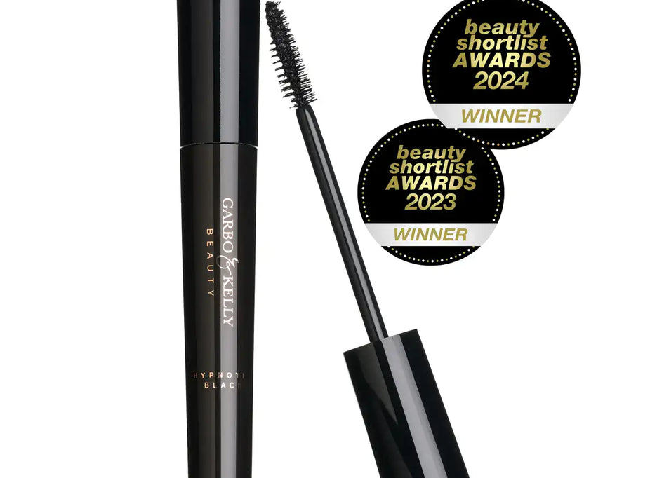 Garbo and Kelly Bombshell Lust Power Vegan Water-Resistant Mascara with volumizing brush on a white background