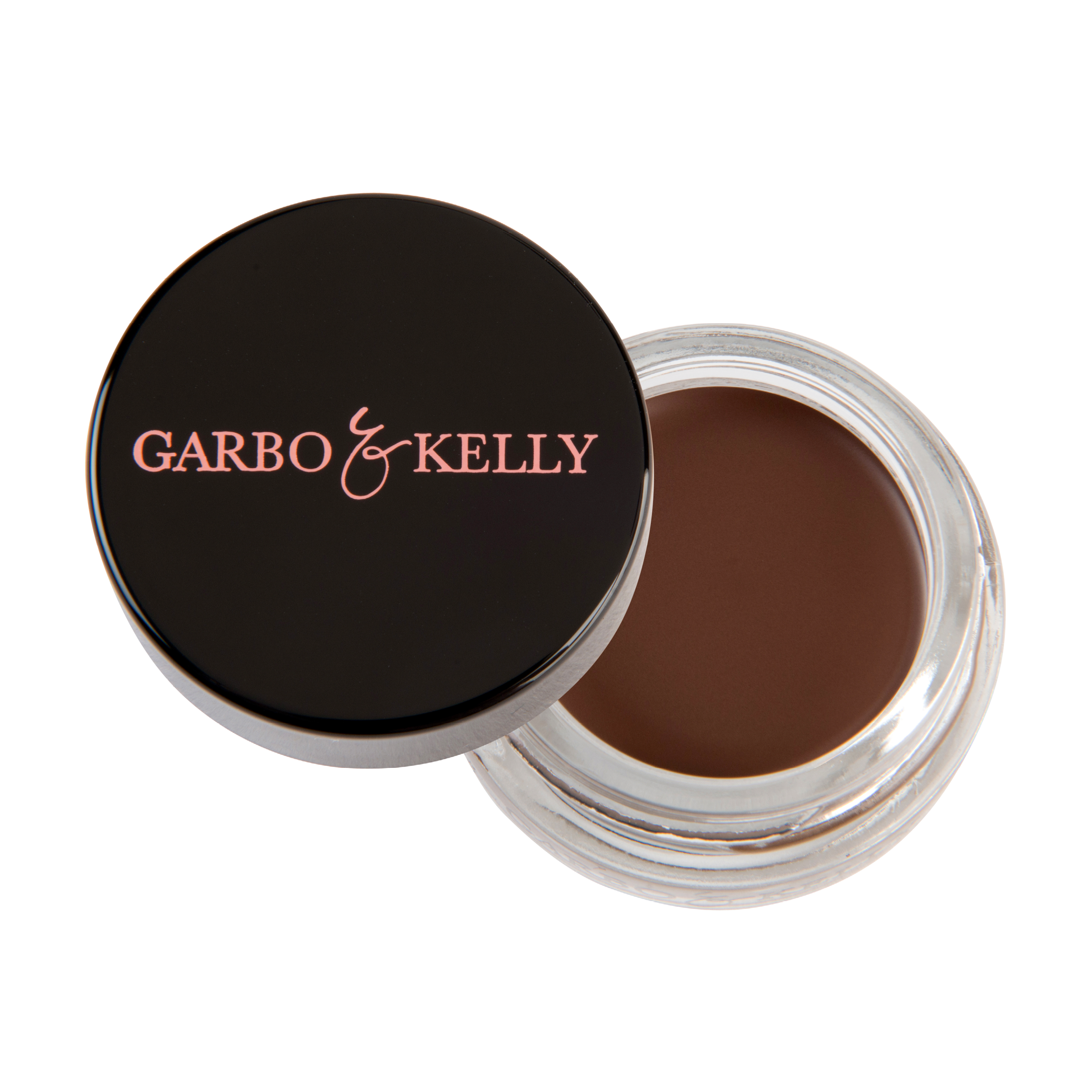 Close-up of Garbo and Kelly brow pomade in a container with a brush, showing the creamy texture and rich color for defined brows.