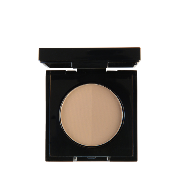 Garbo and Kelly brow powder in a compact, natural shade, showing the finely milled powder and applicator brush.